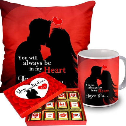 Valentine gift set featuring premium chocolates, a romantic printed mug, and a soft cushion – perfect for expressing love to your partner